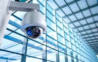Security camera deployed at a commercial facility as part of a direct-to-cloud surveillance system.